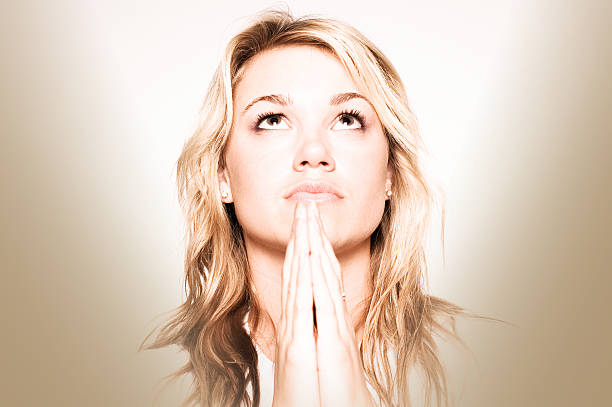 Stylized Prayer Horizontal Focus Beautiful Young Adult Blonde Woman hf7 stock pictures, royalty-free photos & images