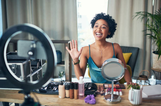 Subscribe for more beauty tips Shot of a influencer recording a makeup tutorial for her blog at home vlogging stock pictures, royalty-free photos & images