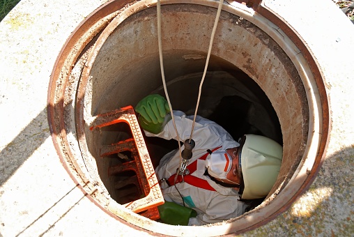A subsurface technician inspects a sewer, to inspect the city's waste water