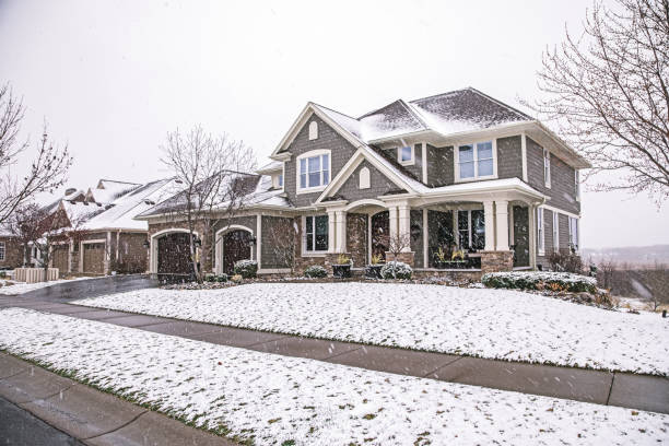 Suburban House Snowing stock photo