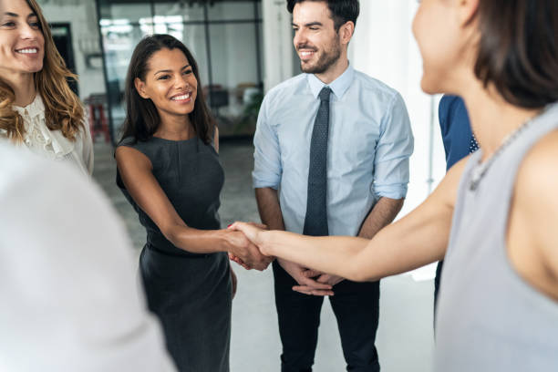 Successful partnership Business people shaking hands in the office coalition stock pictures, royalty-free photos & images