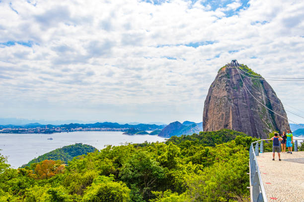 Sugarloaf sugar loaf mountain Pão de Açucar with cable car panorama view in the Urca village in Rio de Janeiro Brazil. stock photo
