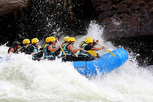 Summer adventure Whitewater boaters come from all over the world to have a summer adventure on the Gauley River. inflatable raft stock pictures, royalty-free photos & images