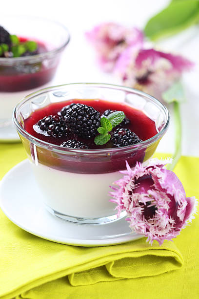 summer dessert with blackberries and cream stock photo