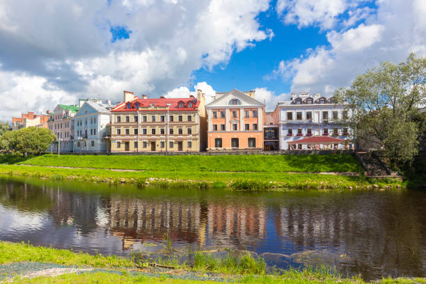 Summer view on town with river and beautiful facades Summer view on town with river and beautiful facades, Pskov, Russia pskov russia stock pictures, royalty-free photos & images