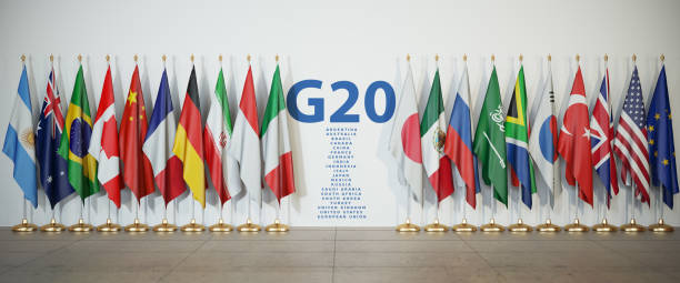 g20-top of vergadering concept. rij van vlaggen van leden van de g20-groep van twintig en lijst van landen, - russia usa ukraine stockfoto's en -beelden