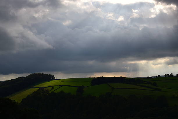 Sun and clouds in Peak District stock photo