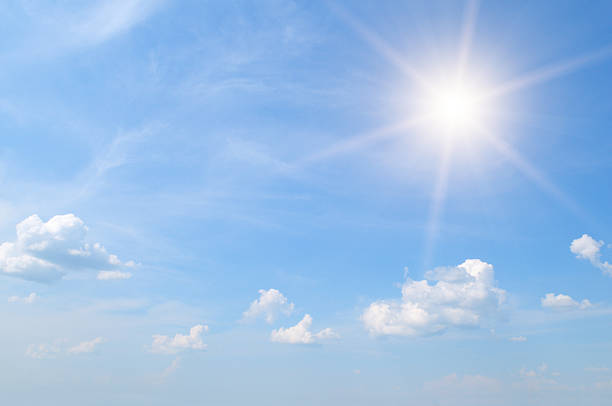 sun on blue sky sun on blue sky with white clouds sunny stock pictures, royalty-free photos & images