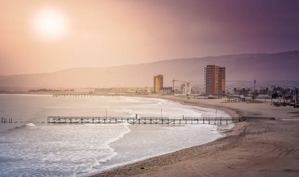 Sun over the beach in Arica stock photo