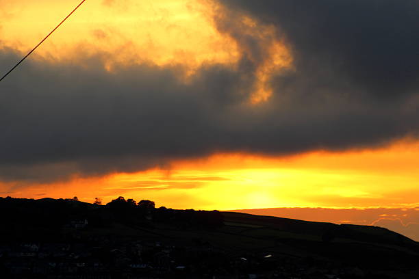 Photo of Sun set clouds - going down over Pennines, West Yorkshire
