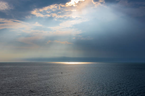 Sunbeams on the ocean stock photo