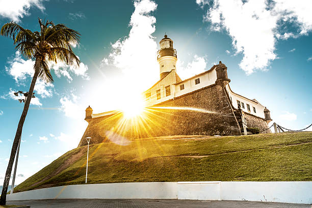 sundown view on  lighthouse Farol da Barra in Salvador stock photo