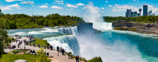 Sunny day at Niagara Falls Panoramic view of Niagara Falls Niagara Falls stock pictures, royalty-free photos & images