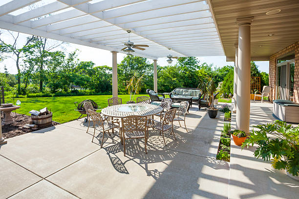 Sunny Patio With Large Pergola  concrete patio stock pictures, royalty-free photos & images