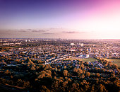 istock Sunrise aerial view of London City Skyline and famous skyscrapers in the the background above a London housing estate. 1043250962