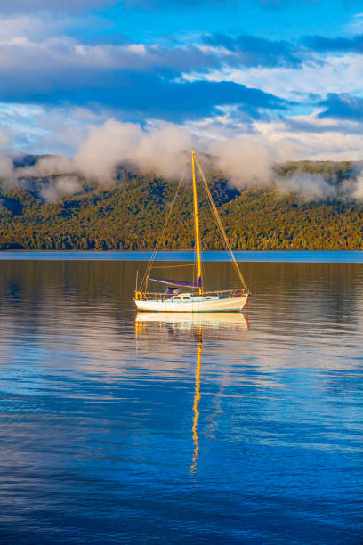 Sunrise at Lake Te Anau, Fjordland National Park, New Zealand, stock photo