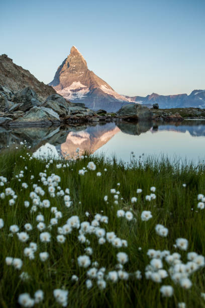 Sunrise at the alpine lake below the famous Matterhorn mountain stock photo