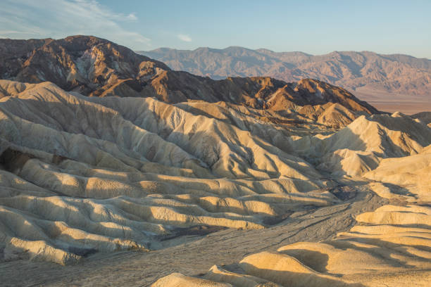 Sunrise in Death Valley National Park, US. View of Zabriskie Point, a natural landmark in Death Valley National Park California. natural landmark stock pictures, royalty-free photos & images