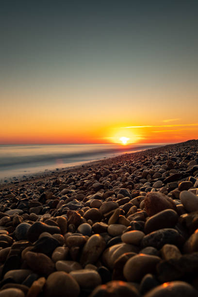 Sunrise in Oman beaches stock photo