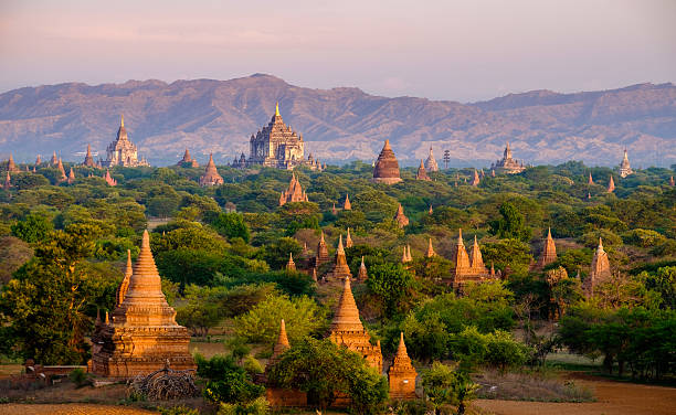 Sunrise landscape view with silhouettes of old temples, Bagan stock photo