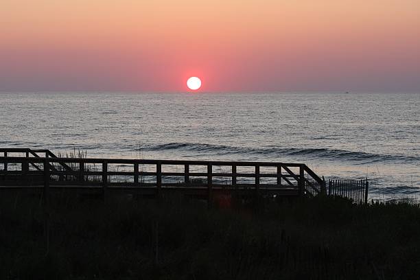 sunrise on ocean  carolina beach north carolina stock pictures, royalty-free photos & images