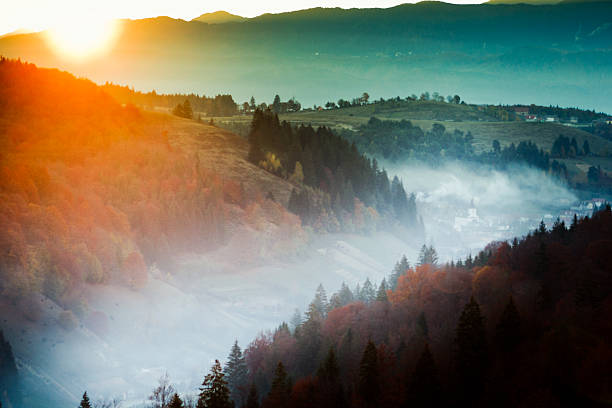 Sunrise over a Romanian village Autumn in Romania Carpatian mountains in the background carpathian mountain range stock pictures, royalty-free photos & images