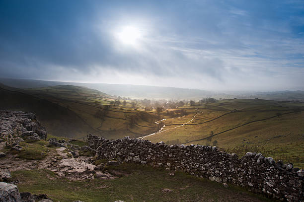 Sunrise over Malham Cove in Yorkshire Dales National Park stock photo