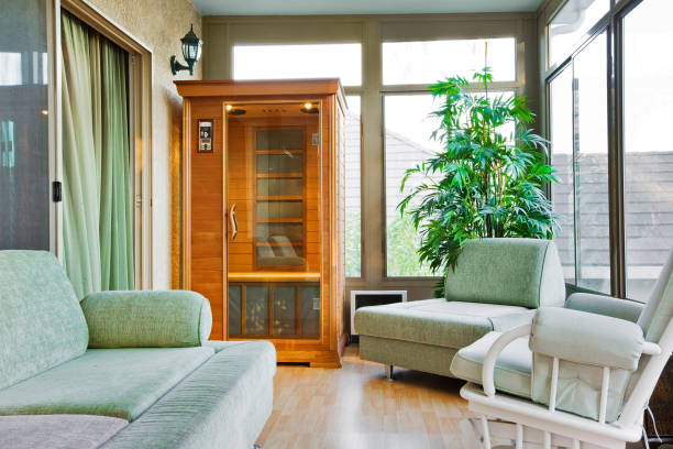 Sunroom With Sauna Sunroom with a small infrared sauna. infrared stock pictures, royalty-free photos & images