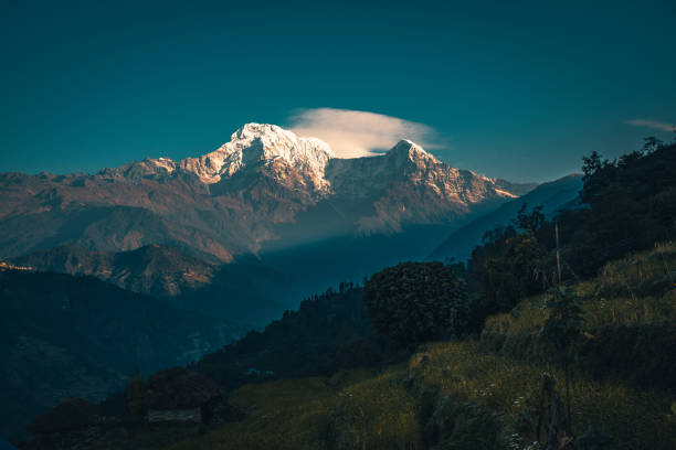 Sunset above Annapurna valley Himalayn mountain near Machapuchare Mardi Himal track in the Himalaya mountains stock photo