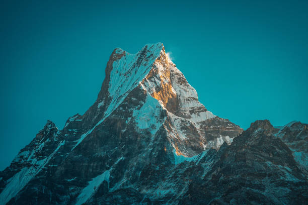 Sunset above Machapuchare Mardi Himal track in the Himalaya mountains stock photo