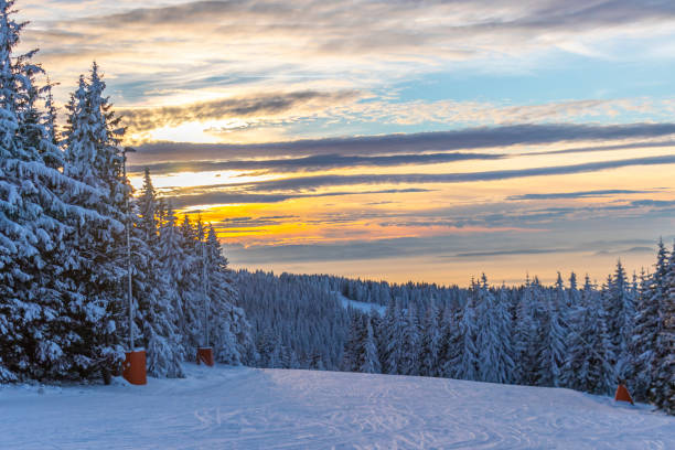 Sunset above ski resort stock photo
