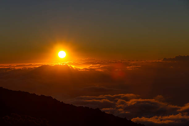 Sunset Above the Clouds at Haleakala National Park stock photo