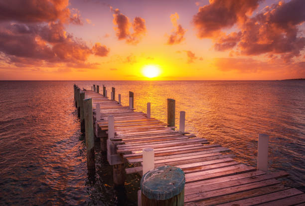 Sunset at Dock in caribbean island Bahamas stock photo