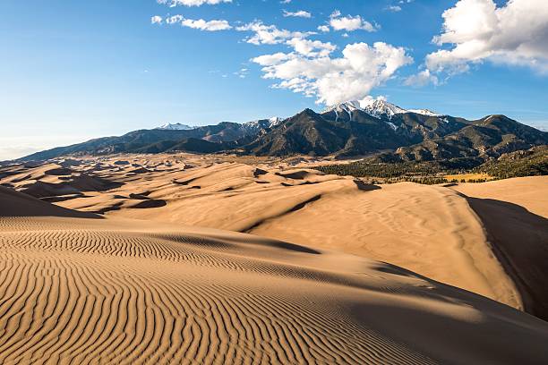 Sunset at Great Sand Dunes Sunset view of sand waves at the top of Great Sand Dunes, Great Sand Dunes National Park & Preserve, Colorado, USA. xu stock pictures, royalty-free photos & images