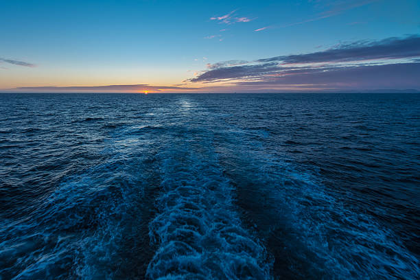 Sunset at the arctic ocean stock photo