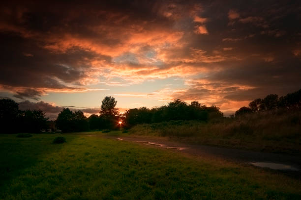sunset at wyken croft park in coventry united kingdom stock photo
