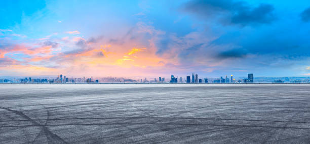 Sunset cityscape and empty asphalt road in Chongqing stock photo