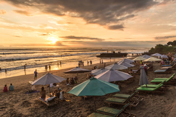 sunset in a beach bar in Canggu beach, just north of Kuta and Seminyak in Bali, Indonesia stock photo