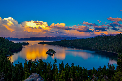 Beautiful sunset with reflections on the water in Emerald bay, South Lake Tahoe, California