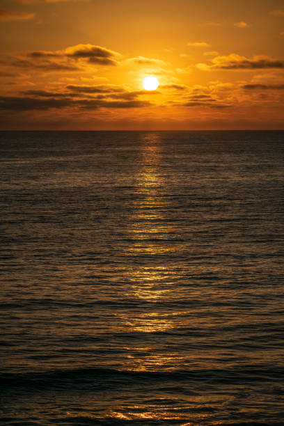 sunset in love <3 pacific ocean. - planet zoom out imagens e fotografias de stock