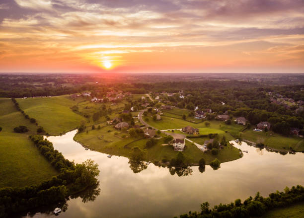 Sunset in rural Kentucky Aerial view of sunset over rural neighborhood in Central Kentucky kentucky stock pictures, royalty-free photos & images