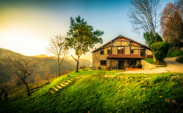 Sunset in the Farmhouse Sunset in a hamlet in the Basque Country stone house stock pictures, royalty-free photos & images