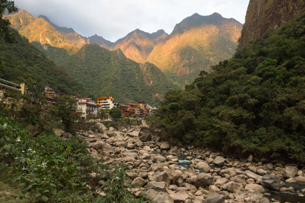 Sunset on Aguas Calientes town seen from the end of the Salkantay Trek stock photo