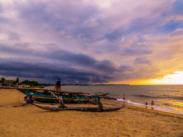 Sunset on the beach in Colombo, Sri Lanka stock photo