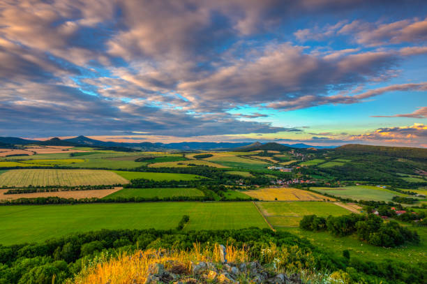 Sunset on the hill in Central Bohemian Uplands Sunset on the hill in Central Bohemian Uplands, Czech Republic. HDR Image. bohemia czech republic stock pictures, royalty-free photos & images