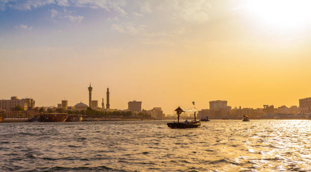 Sunset on the traditional Abra ferries in Dubai stock photo