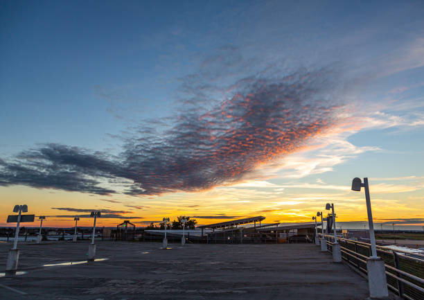 Sunset on the uppermost parking deck of parking lot P1 at Nuremberg Airport stock photo