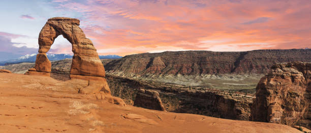 Sunset over Delicate Arch in the USA stock photo