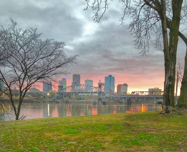 Sunset Over Little Rock A pink autumn sunset hangs over Little Rock Arkansas michael dean shelton stock pictures, royalty-free photos & images