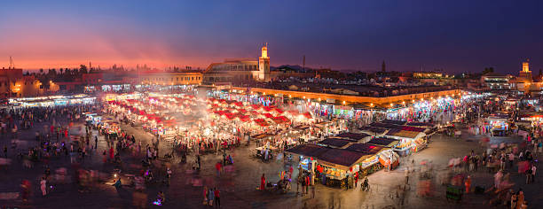 Sunset over Marrakesh Sunset over Jemaa el Fnaa market, Marrakesh, Morocco marrakesh stock pictures, royalty-free photos & images